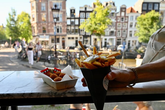10 Tastes of Amsterdam: Food Tour by UNESCO Canals and Jordaan - Café Hegeraad, Royal Palace Glimpse, the Nine Streets Walk, and the Anne Frank Finish