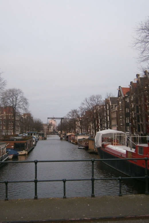 2.5-Hour Amsterdam Sightseeing Tour by Bike - Canal intersections: the real Amsterdam photo subject, up close