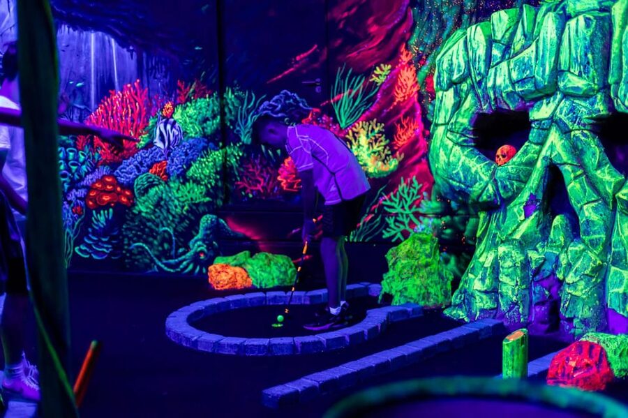 Aloha Amsterdam: 12-Hole Glow-in-the-Dark Mini-Golf - The 12-Hole Course: Ships, Pirates, and Underwater UV Magic