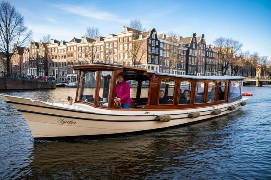 Amsterdam:1.5-Hour Canal Cruise local Guide, Drinks & Snacks - Dutch Bites, Beer, Wine, and Staying Warm on an Open Electric Boat