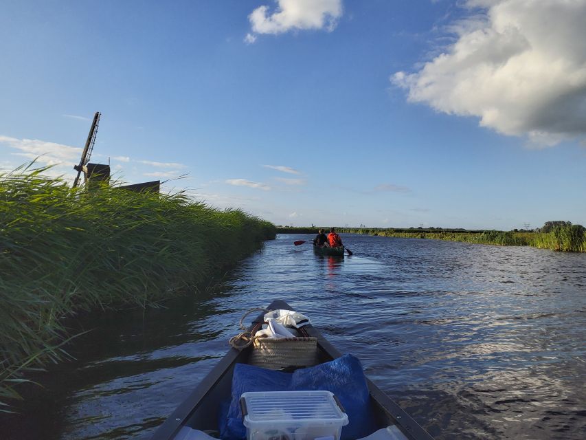 Amsterdam: 2-Hour Guided Canoe Trip - Meeting Point at the Blue House Behind the Church