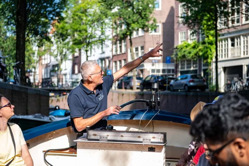 Amsterdam: 75 minute Open Boat Canal Cruise with Live Guide - Key highlights you will feel right away