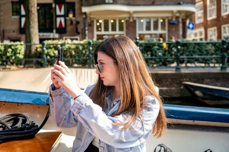 Amsterdam: 75 minute Open Boat Canal Cruise with Live Guide - Captain style matters, and this one varies but usually shines
