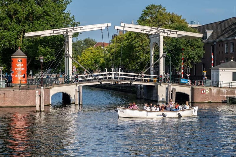 Amsterdam: 75 minute Open Boat Canal Cruise with Live Guide - Best time to go, and how timing changes what you see