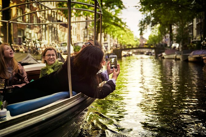 Amsterdam 90-min Private Canal Cruise with Live Guide and Drinks - Quick hits before you board