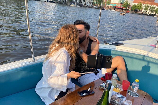 Amsterdam 90-min Private Canal Cruise with Live Guide and Drinks - Why an evening canal cruise makes Amsterdam feel personal