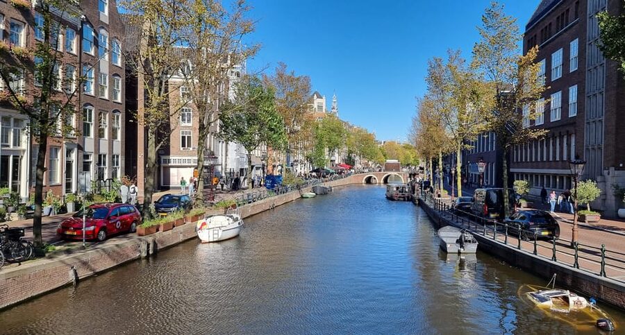 Amsterdam All In One Tour Walking Tour - Dam Square and the Royal Palace: the quick-start to Amsterdam’s power story