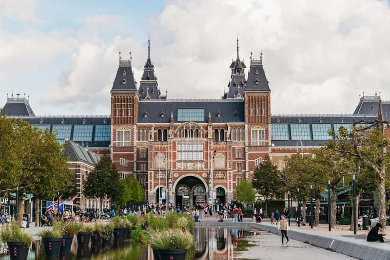 Amsterdam: Bike Tour with Optional Cruise in Small-Group - Entering the Amsterdam bike mindset on a small-group tour