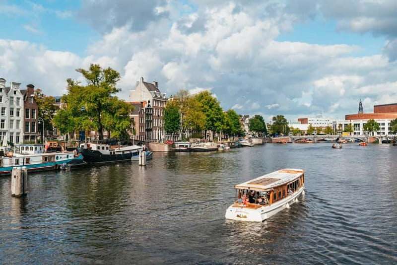 Amsterdam: Bike Tour with Optional Cruise in Small-Group - Windmill de Gooyer to Magere Brug, two photo stops that explain Amsterdam