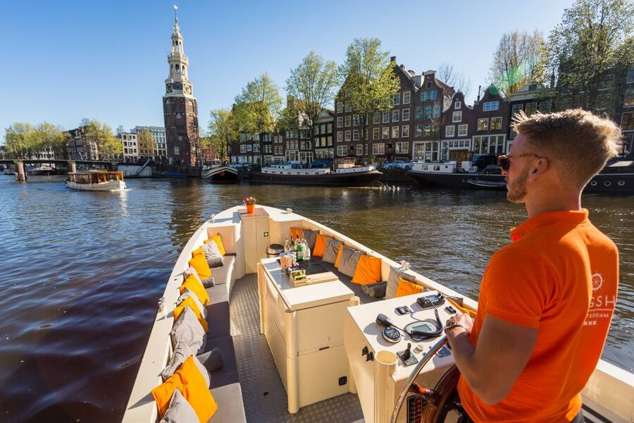 Amsterdam: Canal Belt Private Beer Boat Tour - Beer on board: included, practical, and group-friendly