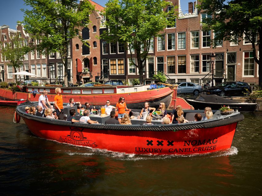 Amsterdam: Canal Belt Private Beer Boat Tour - Weather, clothing, and the open-top reality