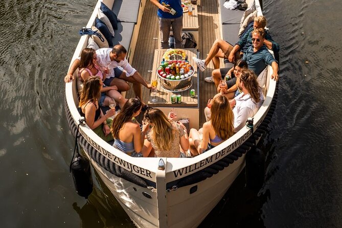 Amsterdam: Canal Booze Cruise with Unlimited Drinks Option - Drink Options: 2 Drinks or Unlimited Beer, Wine, and Soda