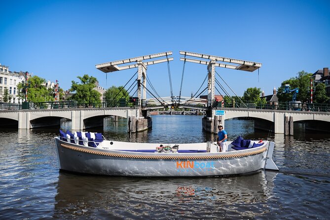 Amsterdam Canal Cruise in Open Boat with Unlimited Drinks Option - Weather, Blankets, and Staying Comfortable on an Open Boat