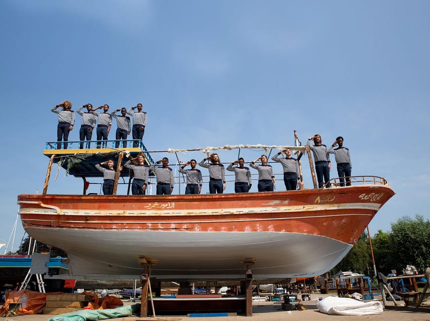 Amsterdam: Canal Cruise on a Wooden Refugee Boat - A wooden refugee boat tour with refugee storytellers at the helm