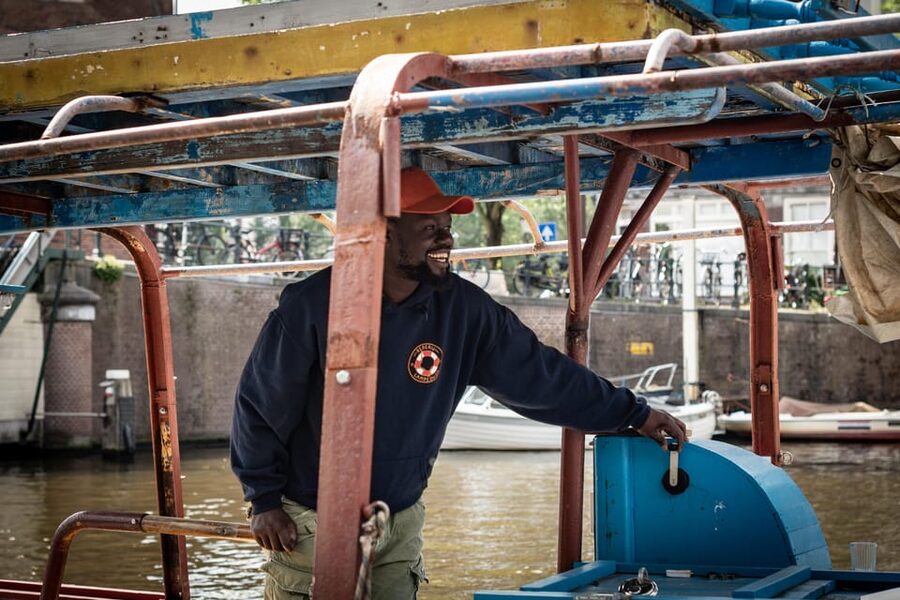 Amsterdam: Canal Cruise on a Wooden Refugee Boat - How the conversation works: questions, interaction, and feeling seen