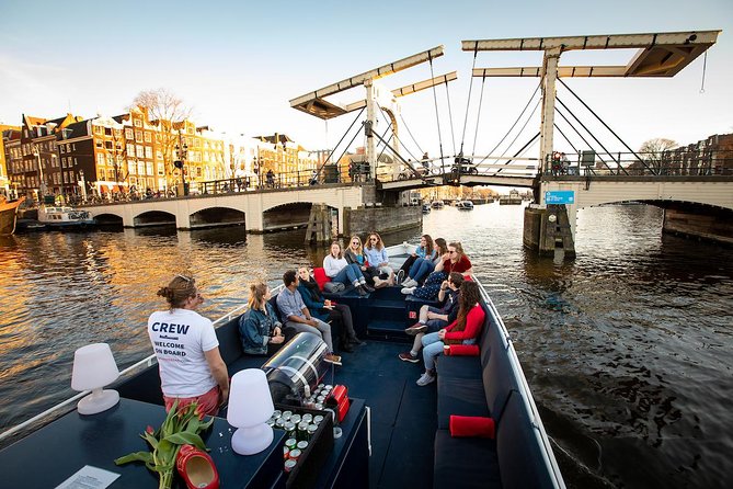 Amsterdam Canal Cruise With Live Guide and Unlimited Drinks - The actual route: Hermitage-area start, Amstel to the canal ring, and the big landmarks you will spot