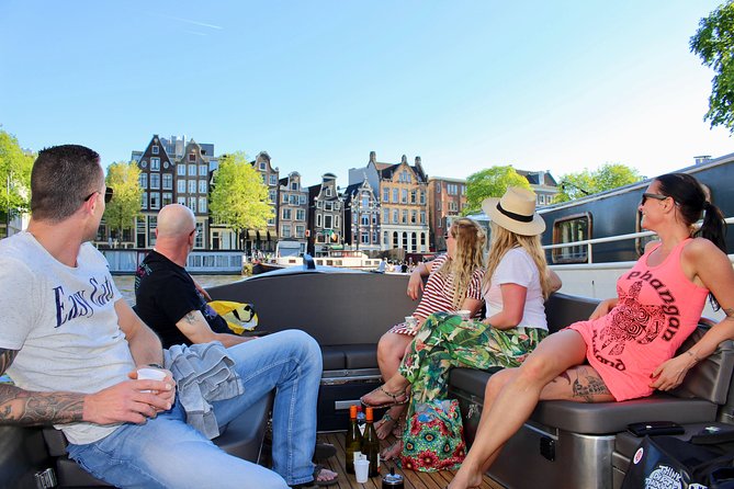 Amsterdam Canal Tour by Open Boat – 90 min Small Group Experience - Where you meet and how the onboard comfort works
