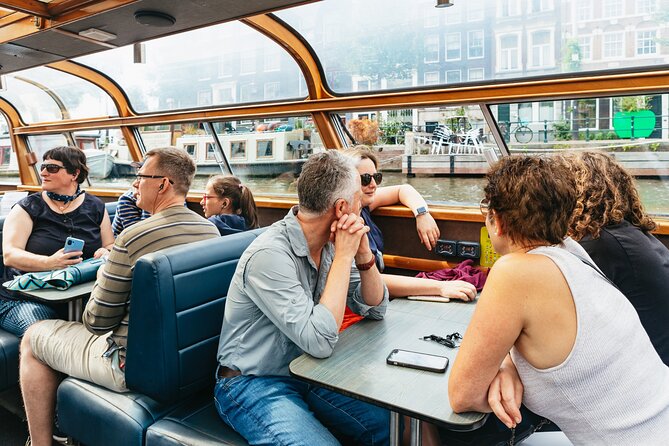Amsterdam City Centre Cruise on heated boat with Audioguide - The One-Hour Route: From Centraal Station to the Skinny Bridge