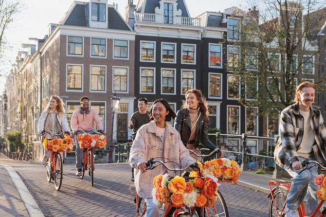 Amsterdam City Top Highlights Guided Bike Tour - Cafe streets and the Red Light District bike pass, handled quickly