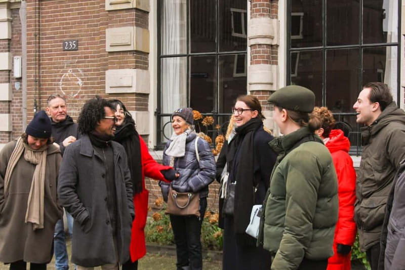 Amsterdam: City walking experience with a local - Nieuwmarkt Square and Amsterdam Centraal: How the City Moves