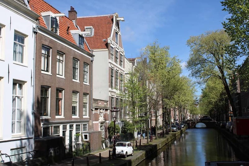 Amsterdam: City walking experience with a local - Stroopwafel Midway and a Souvenir That Actually Helps