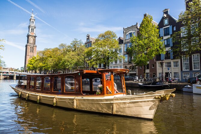 Amsterdam Classic Saloon Boat Canal Cruise with Live Guide - Key Highlights to Know Before You Go
