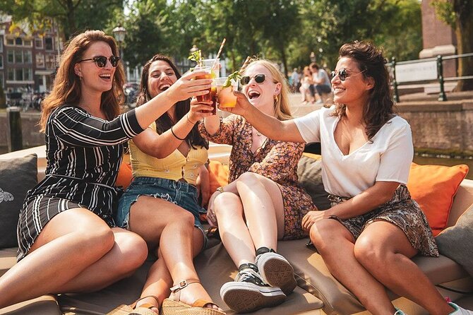 Amsterdam Classic Saloon Boat Canal Cruise with Live Guide - Boat Comfort, Open-Air Views, and What Weather Changes