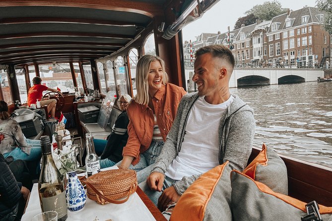 Amsterdam Classic Saloon Boat Cruise with Drinks and Cheese - Stop Highlights Without the Ticket Lines
