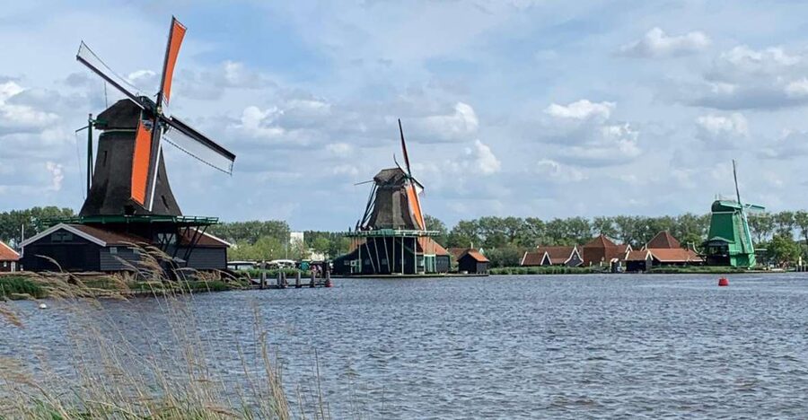 Amsterdam: Countryside Bike Tour and Zaanse Schans Windmills - First Stop Power: Sawmill Insights and Windmill Workings