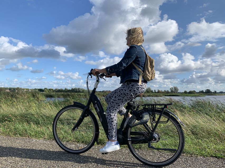 Amsterdam: Countryside Bike Tour and Zaanse Schans Windmills - Clogs and Cheese: The Most Fun Hands-On Stops
