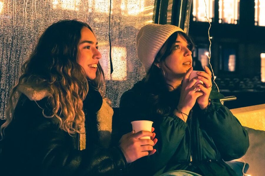 Amsterdam: Covered Canal Booze Cruise with Unlimited Drinks - Rain or shine, covered boat logic, and what to wear