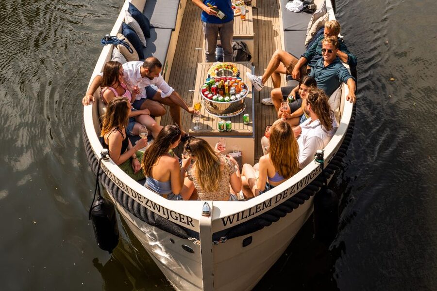 Amsterdam: Cozy Evening Canal Cruise With Open Bar Option - The Hosts and Skipper: Why the Tour Feels Personal (Even With a Small Group)