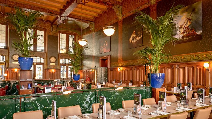 Amsterdam: Dutch Bitterballen and Croquette Tasting - The room itself: 1885 waiting-room details, old signage, and a station view