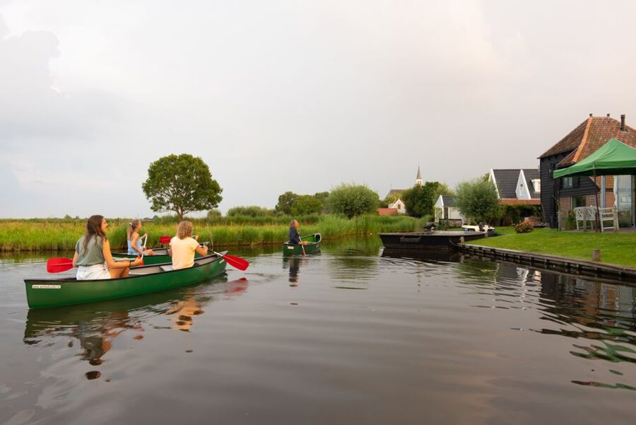 Amsterdam: Dutch Countryside Sunset Canoe Tour - Paddling through farms, mills, and grazing fields in the polders