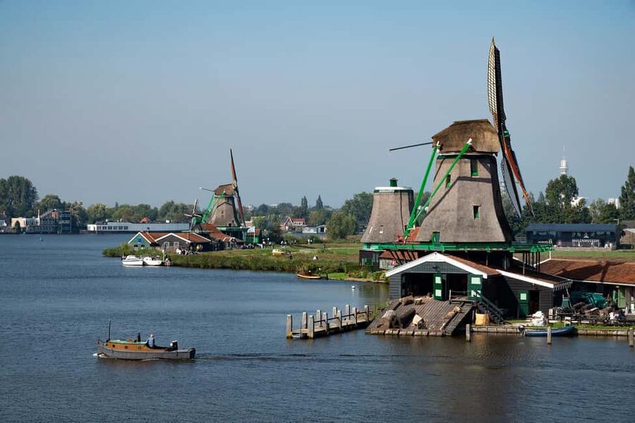 Amsterdam: Explore Zaanse Schans: Half-Day Luxury Coach Trip - Getting to Zaanse Schans: the ferry meet-up at This is Holland