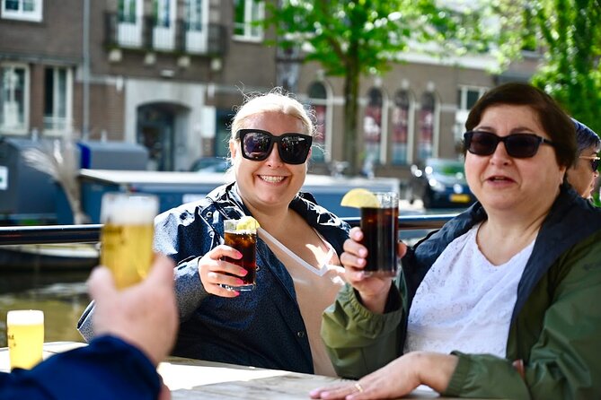 Amsterdam Food Tour of 10+ Local Classic Tastings in Jordaan Area - Landmark passes: Westertoren, the queer memorial, and Anne Frank area context