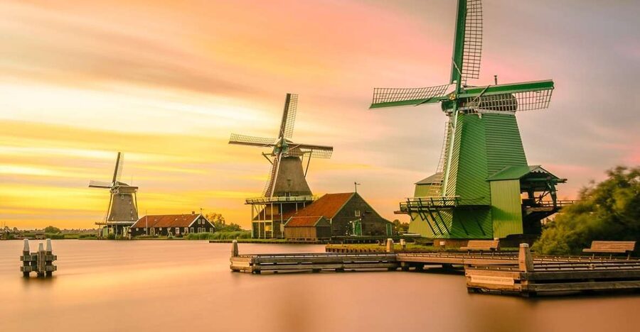 Amsterdam: Giethoorn Tour with Canal Cruise and Windmills - Zaanse Schans windmills and wooden workshops: the photo stop that teaches you something