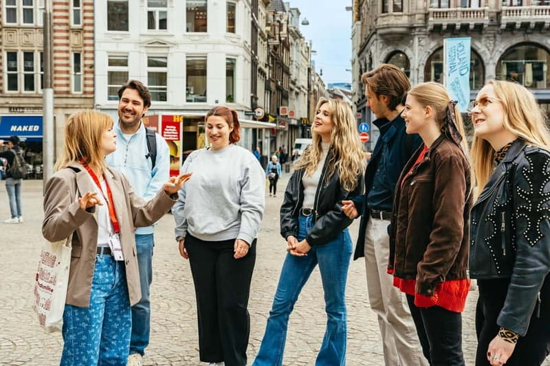 Amsterdam: Guided Cultural Walking Tour - Ending back at the National Monument: remembrance that broadens
