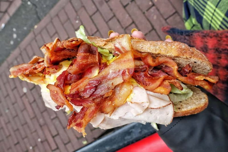 Amsterdam: Guided Food Tour with Tastings - How the 3.5-hour format works, walking vs biking