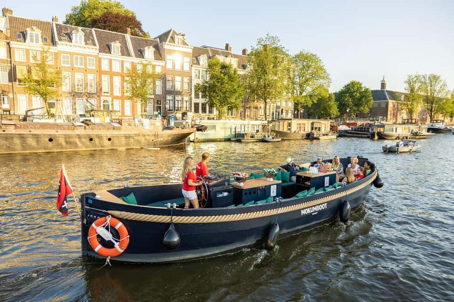 Amsterdam: Guided Open Boat Canal Cruise Including Drink - Electric, open-air canal cruising in Amsterdam’s center