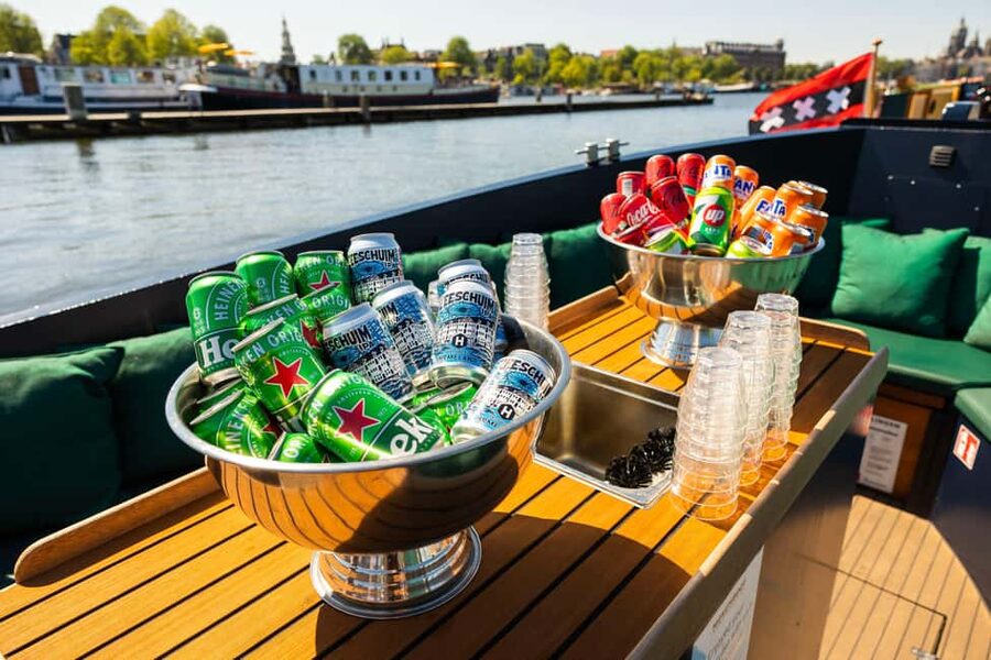 Amsterdam: Guided Open Boat Canal Cruise Including Drink - The itinerary, stop by stop, and why each one matters