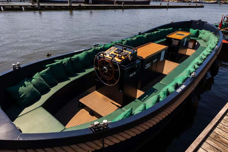 Amsterdam: Guided Open Boat Canal Cruise Including Drink - Price and value: $26 for one hour plus context