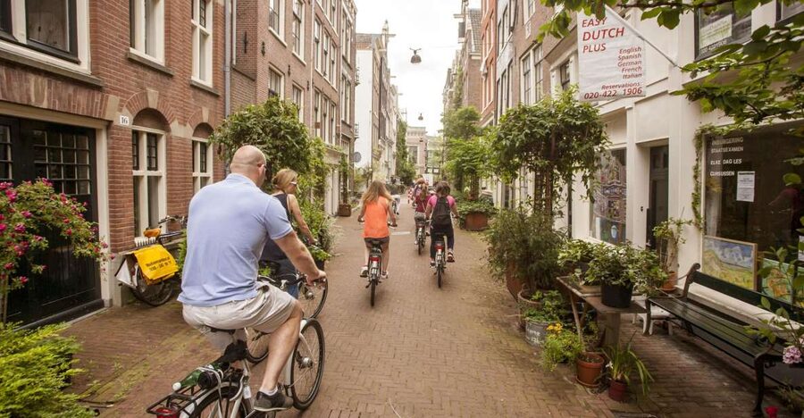 Amsterdam: Hidden Gems & Highlights Guided Bike Tour - Why Amsterdam Looks Different From a Bike Seat