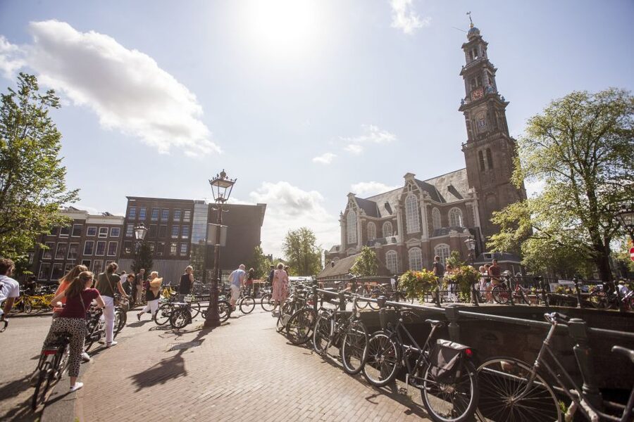 Amsterdam: Hidden Gems & Highlights Guided Bike Tour - The Jordaan: Courtyards, Churches, and Canal-Ring Bridge Moments