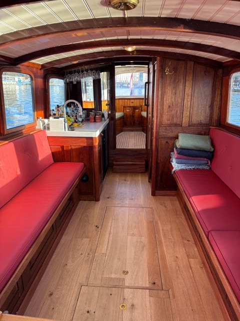 Amsterdam: Historic Boat Cruise with open bar and nibbles - A 1911 Salon Boat That Feels Like a Local Hangout
