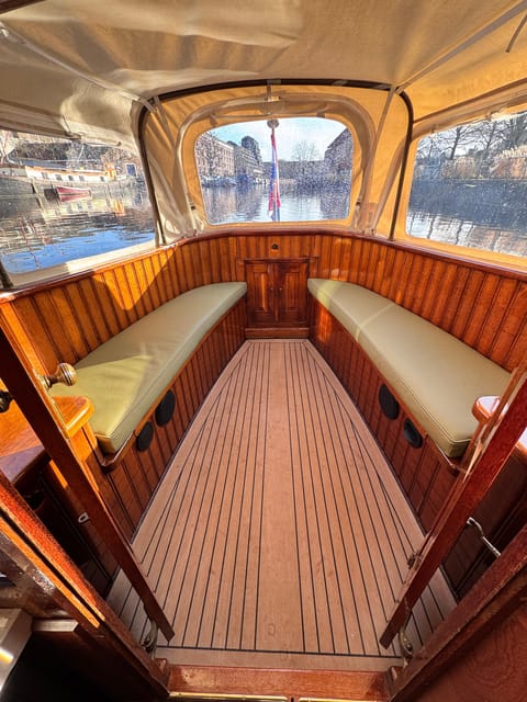 Amsterdam: Historic Boat Cruise with open bar and nibbles - Price, Value, and What You Are Really Paying For