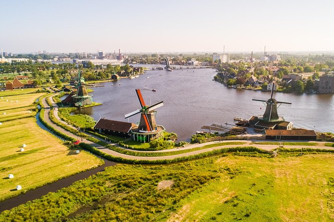 Amsterdam: Keukenhof, Zaanse Schans & Volendam Tour - Volendam and Marken by Boat: Stilt Houses, Traditional Dress, and a Scenic Break
