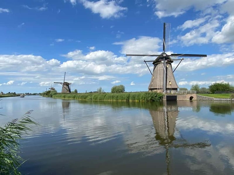 Amsterdam: Kinderdijk, Euromast, Delft and Den Haag Day Tour - Key highlights to know before you go