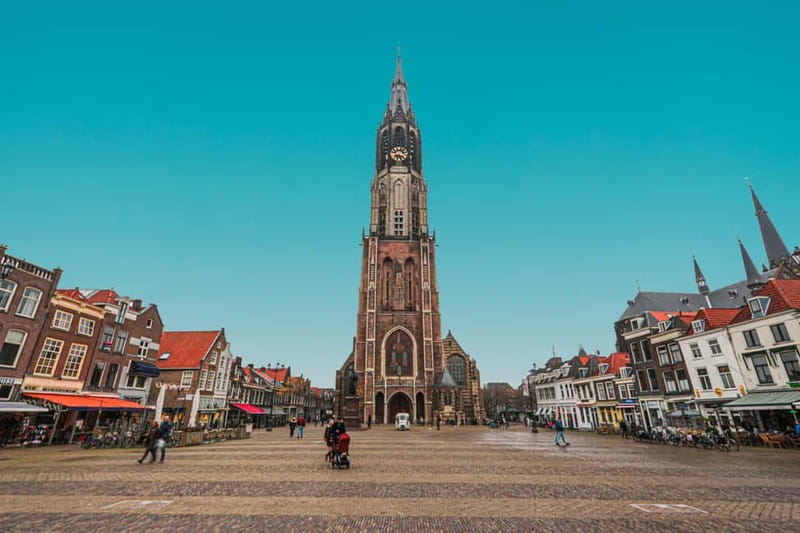 Amsterdam: Kinderdijk, Euromast, Delft and Den Haag Day Tour - A fast-hit Holland sampler: windmills, canals, and big-city power