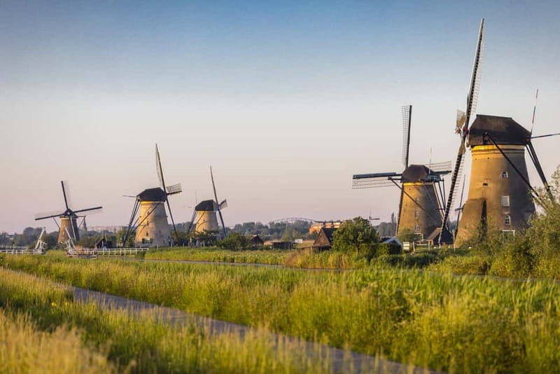 Amsterdam: Kinderdijk, Euromast, Delft and Den Haag Day Tour - Price and what you get for $152